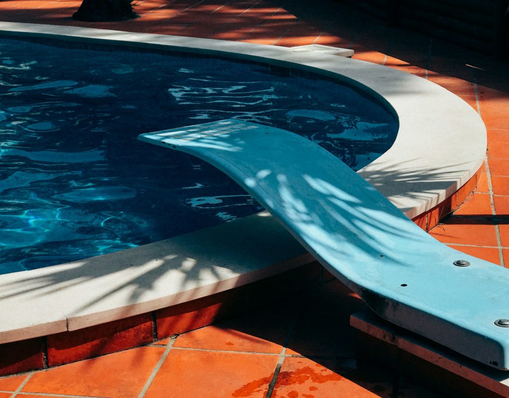white and blue swimming pool